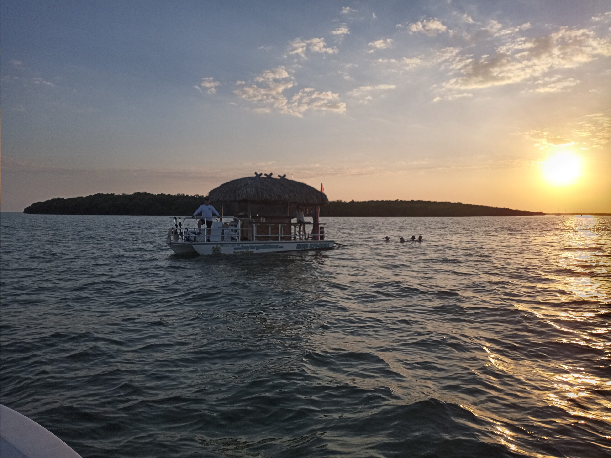 Tiki Boat with Shade & LED Night Lights for a Comfortable and Relaxing Ride